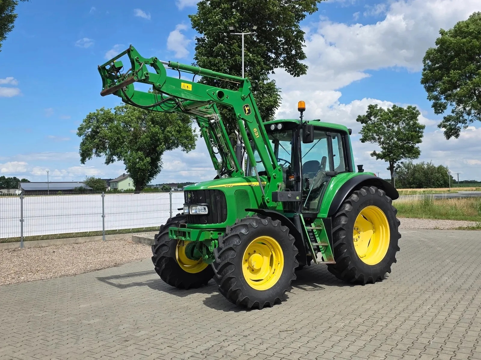 John Deere 6320 — foto 1