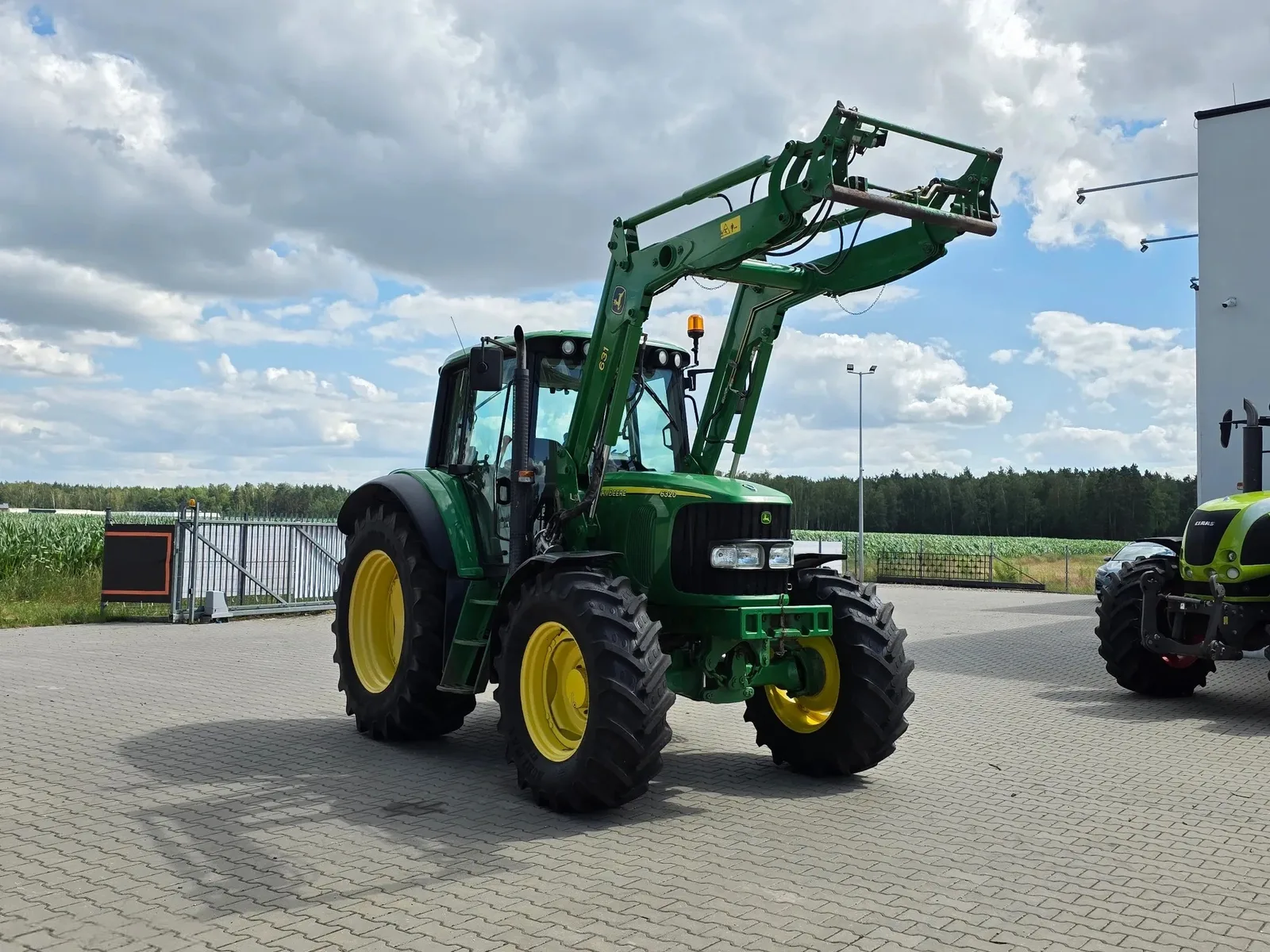 John Deere 6320 — foto 7