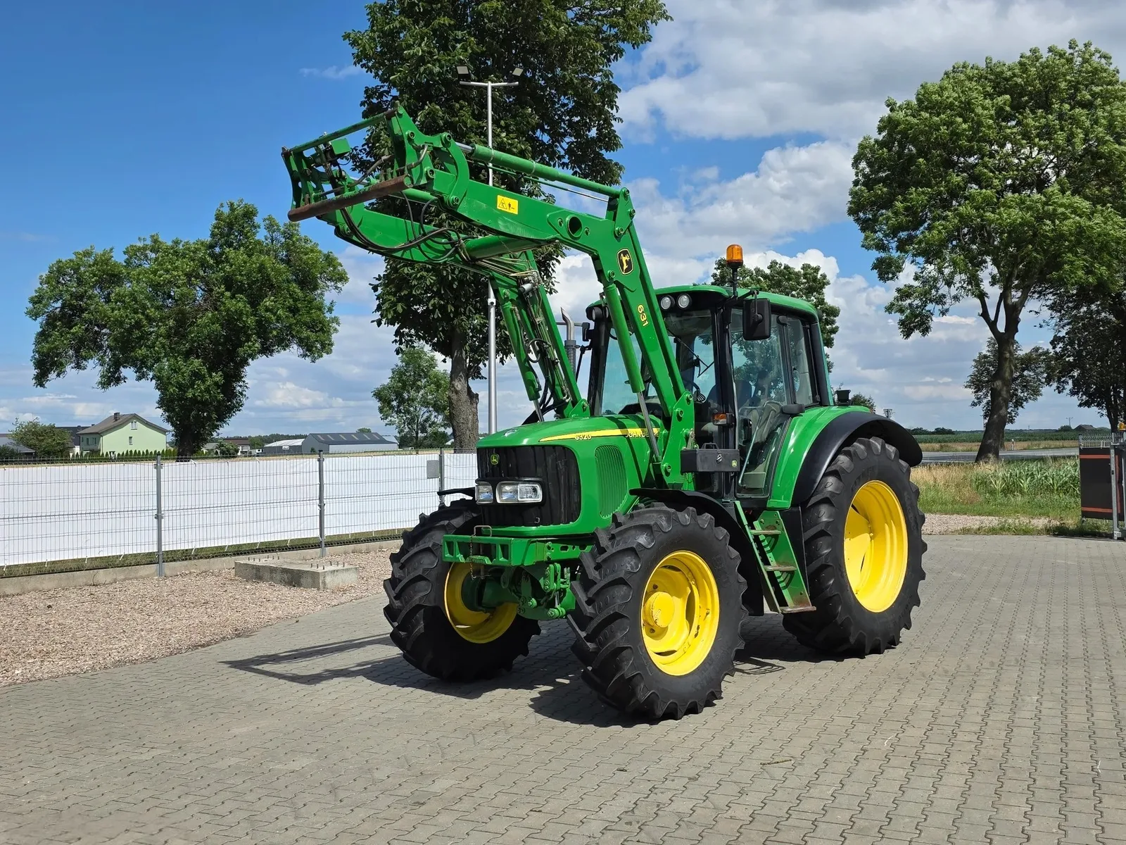 John Deere 6320 — foto 9