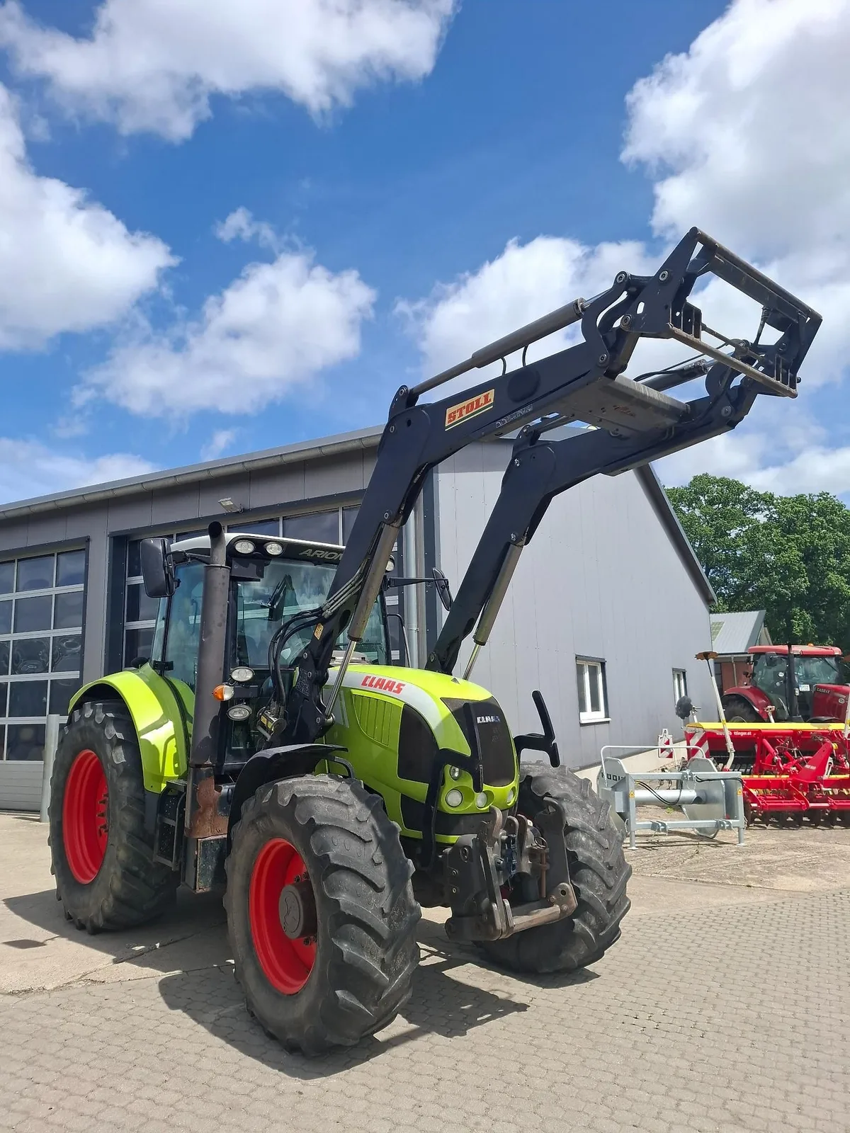Claas Arion 640 — foto 1